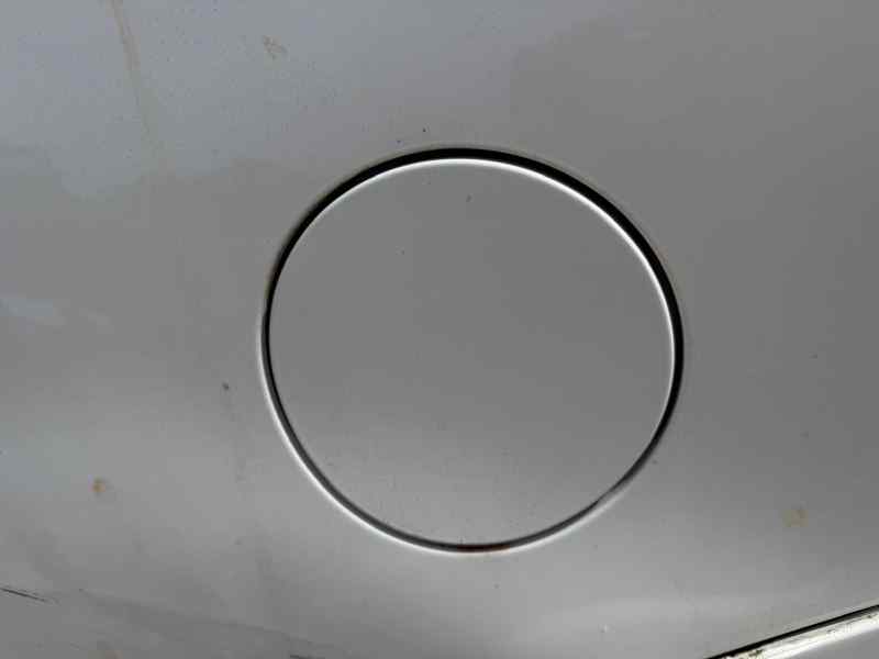 TAPA EXTERIOR COMBUSTIBLE