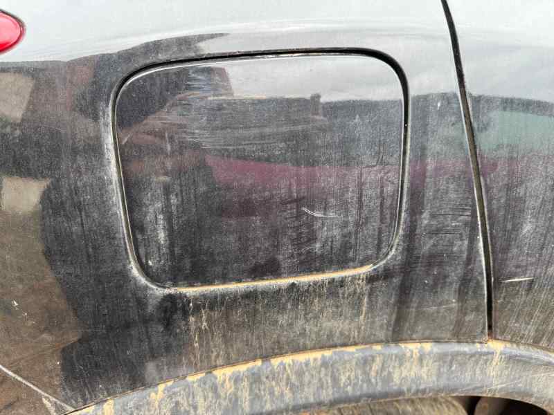 TAPA EXTERIOR COMBUSTIBLE