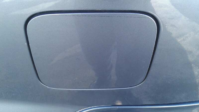 TAPA EXTERIOR COMBUSTIBLE