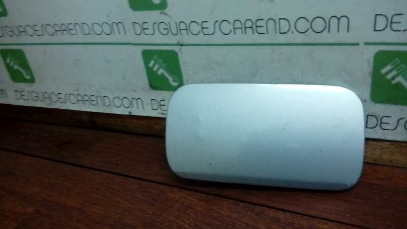 TAPA EXTERIOR COMBUSTIBLE