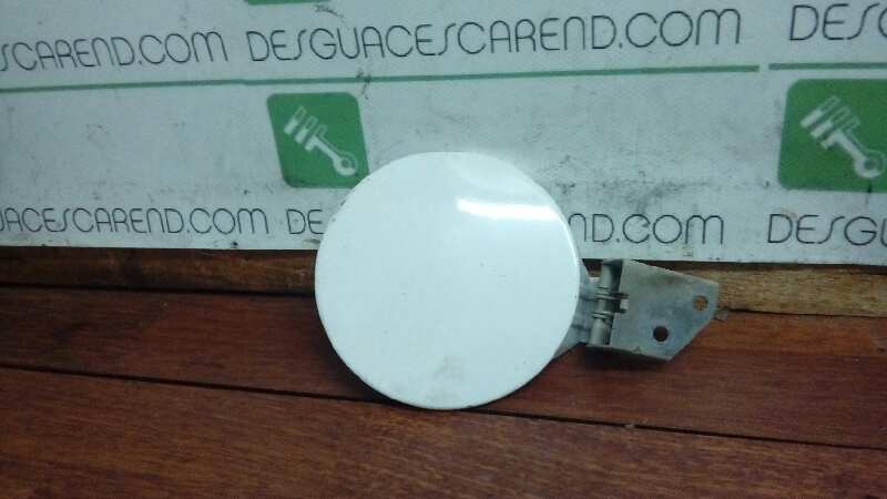 TAPA EXTERIOR COMBUSTIBLE