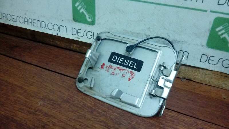 TAPA EXTERIOR COMBUSTIBLE