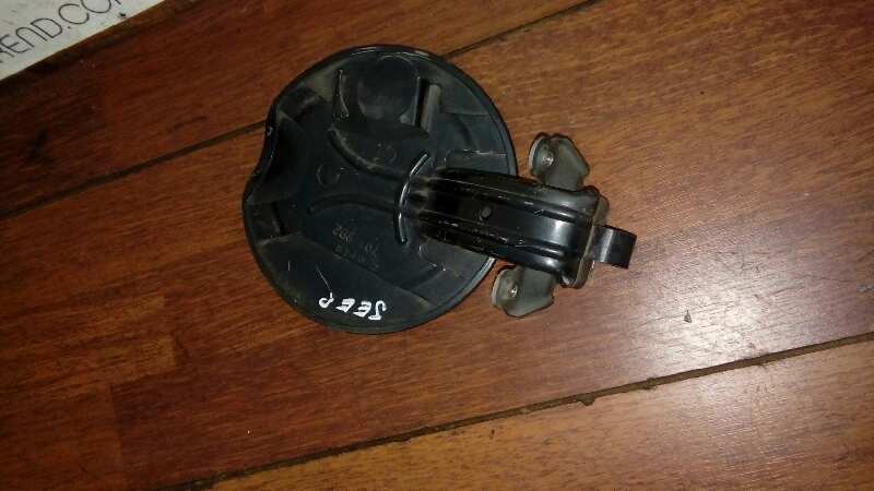 TAPA EXTERIOR COMBUSTIBLE