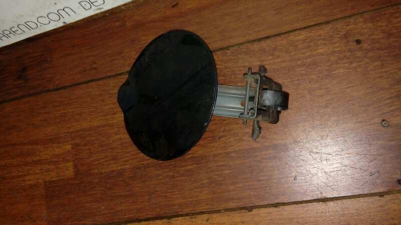 TAPA EXTERIOR COMBUSTIBLE