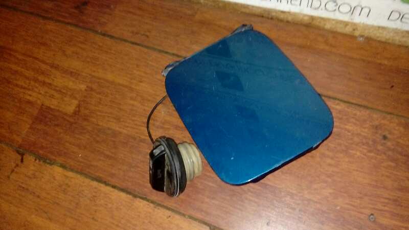 TAPA EXTERIOR COMBUSTIBLE