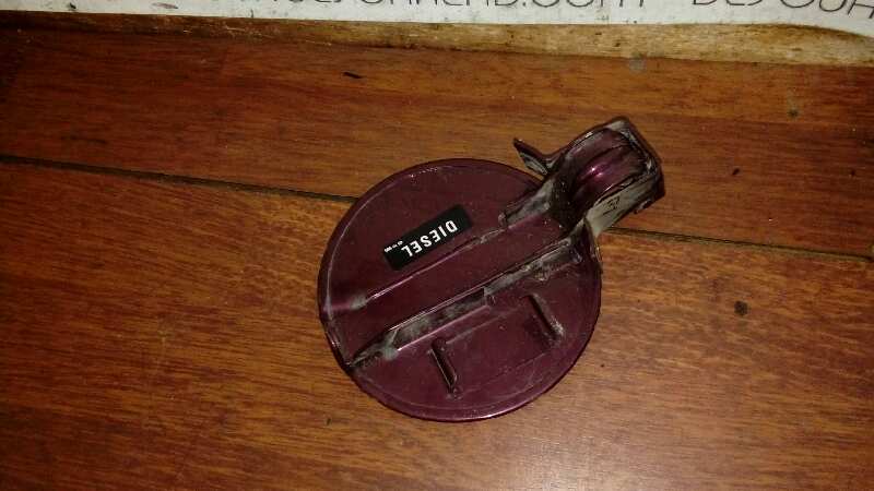 TAPA EXTERIOR COMBUSTIBLE