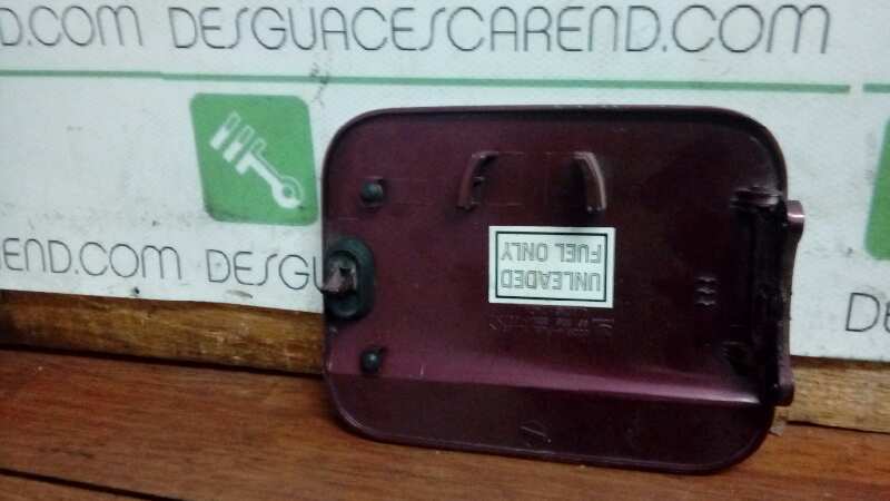 TAPA EXTERIOR COMBUSTIBLE