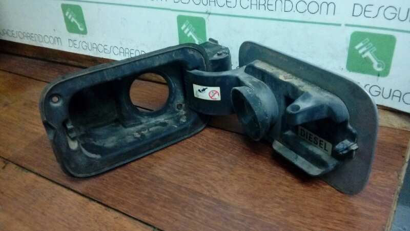 TAPA EXTERIOR COMBUSTIBLE