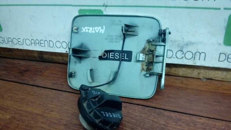 TAPA EXTERIOR COMBUSTIBLE