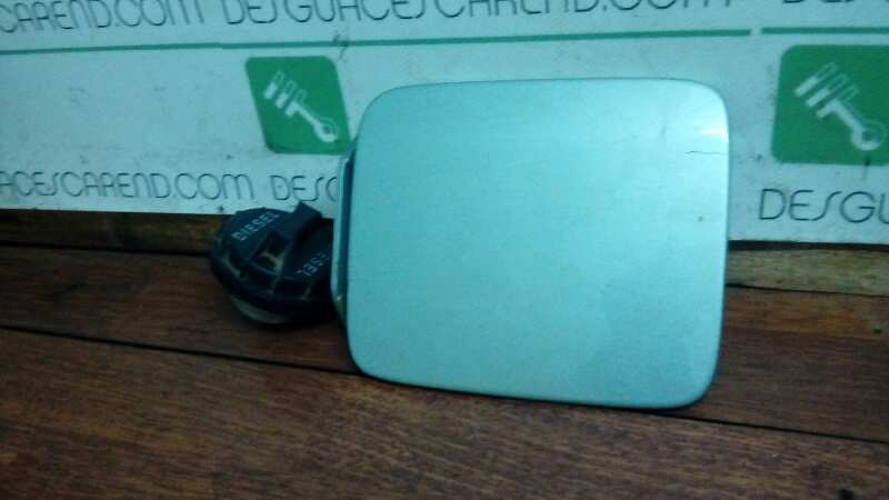 TAPA EXTERIOR COMBUSTIBLE