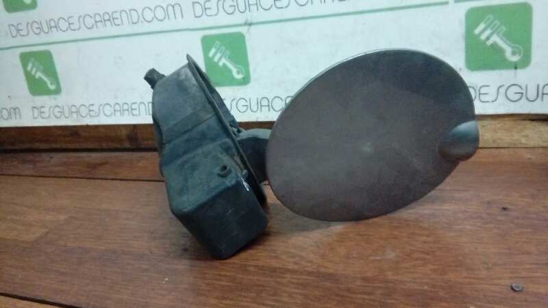 TAPA EXTERIOR COMBUSTIBLE