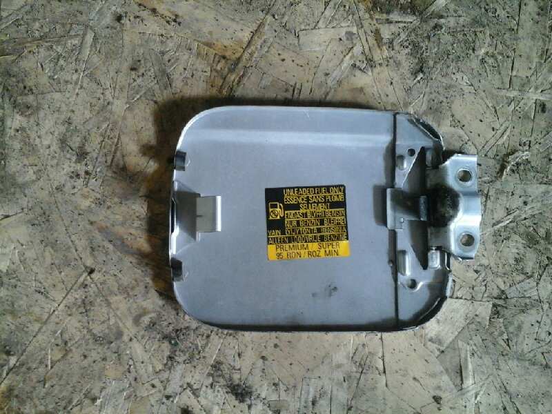 TAPA EXTERIOR COMBUSTIBLE