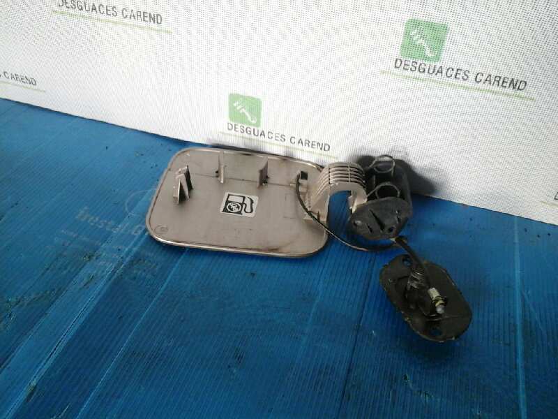 TAPA EXTERIOR COMBUSTIBLE