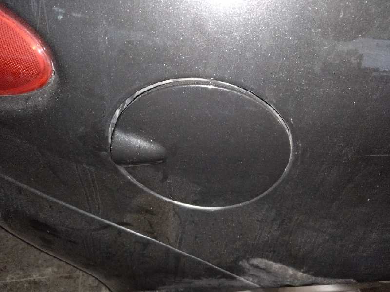 TAPA EXTERIOR COMBUSTIBLE