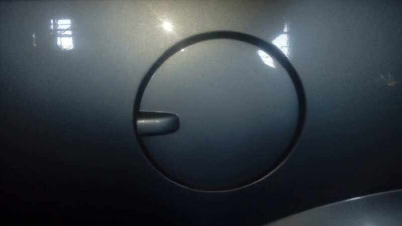 TAPA EXTERIOR COMBUSTIBLE