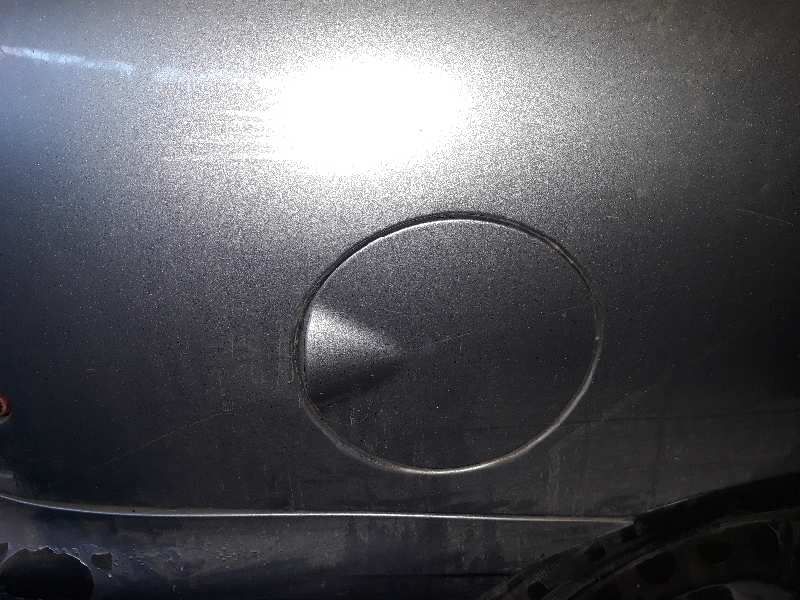 TAPA EXTERIOR COMBUSTIBLE