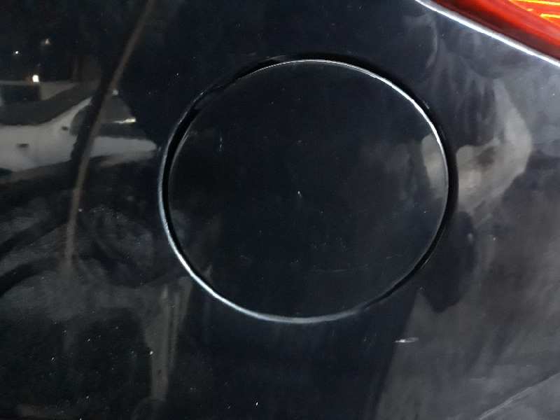 TAPA EXTERIOR COMBUSTIBLE