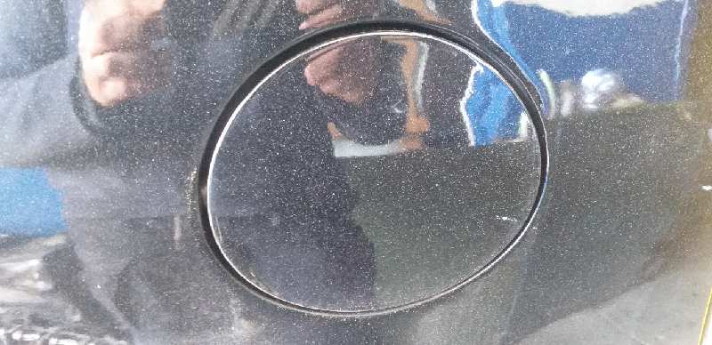 TAPA EXTERIOR COMBUSTIBLE