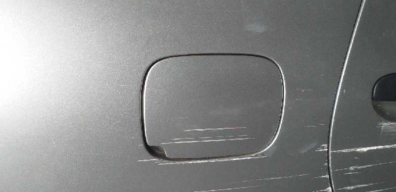 TAPA EXTERIOR COMBUSTIBLE