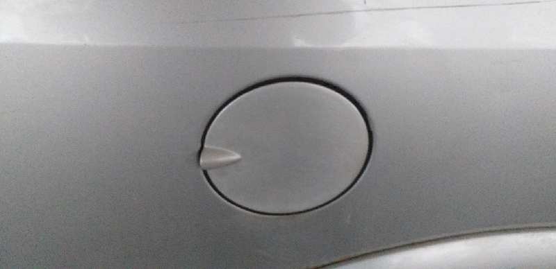 TAPA EXTERIOR COMBUSTIBLE