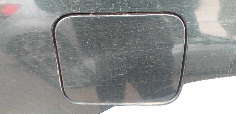 TAPA EXTERIOR COMBUSTIBLE