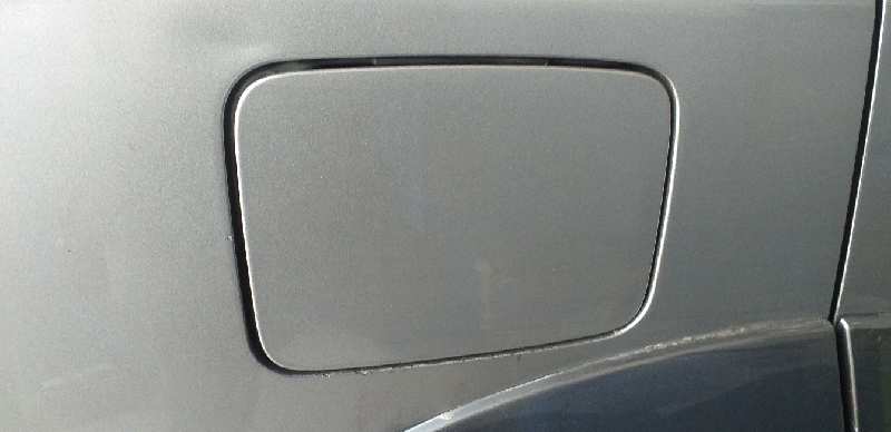 TAPA EXTERIOR COMBUSTIBLE