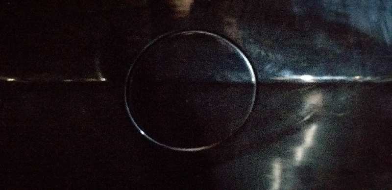 TAPA EXTERIOR COMBUSTIBLE