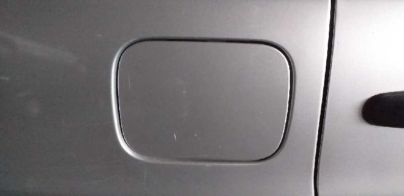 TAPA EXTERIOR COMBUSTIBLE