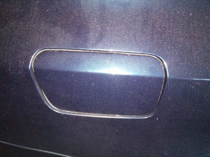 TAPA EXTERIOR COMBUSTIBLE