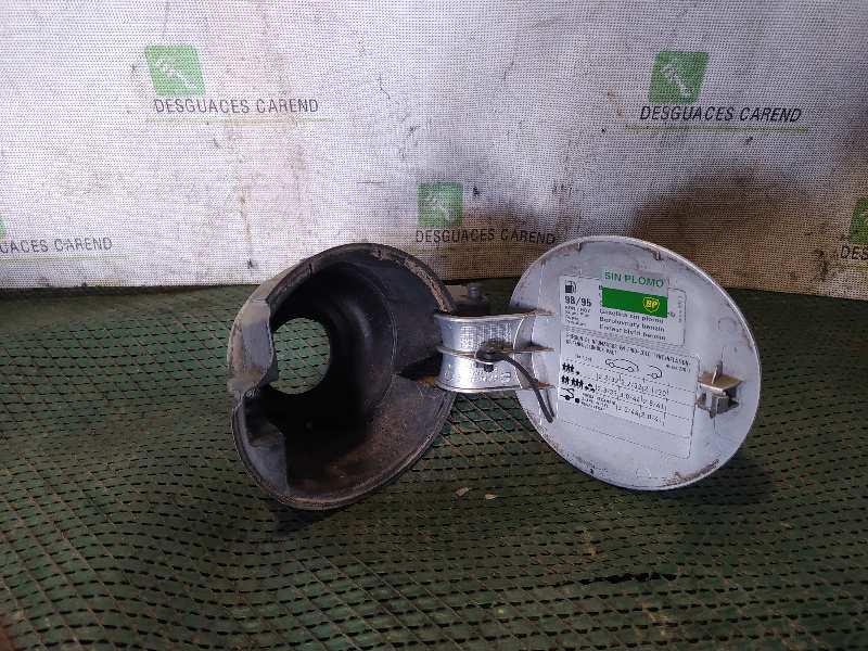 TAPA EXTERIOR COMBUSTIBLE