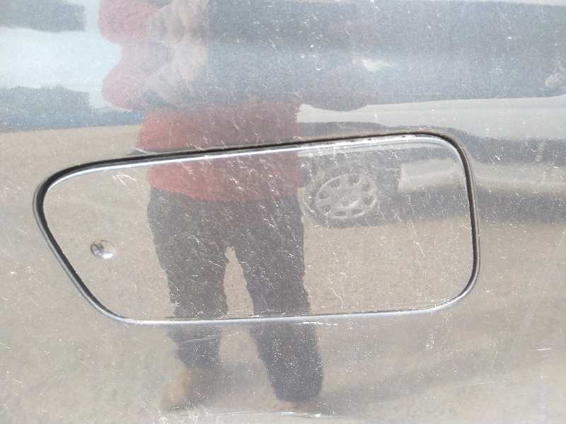 TAPA EXTERIOR COMBUSTIBLE