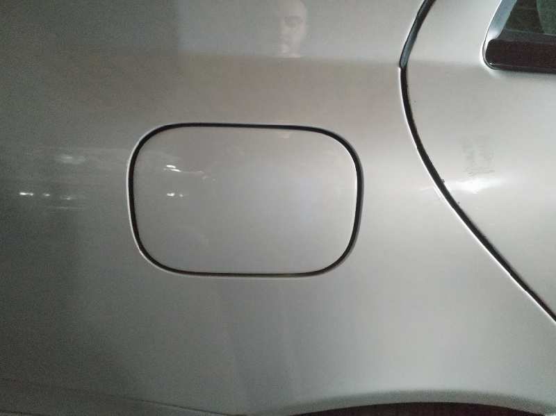 TAPA EXTERIOR COMBUSTIBLE