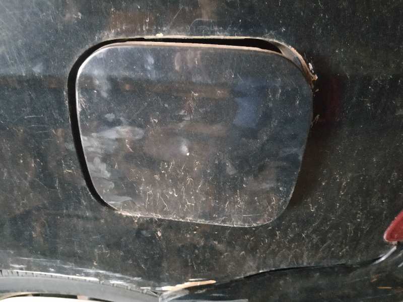 TAPA EXTERIOR COMBUSTIBLE