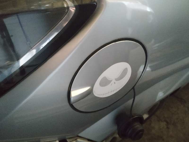 TAPA EXTERIOR COMBUSTIBLE