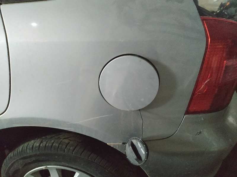 TAPA EXTERIOR COMBUSTIBLE