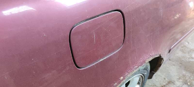 TAPA EXTERIOR COMBUSTIBLE