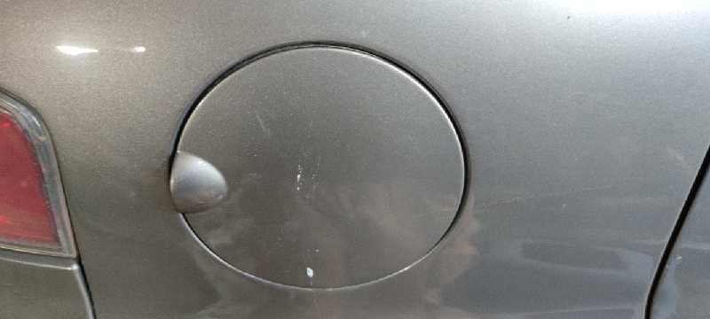 TAPA EXTERIOR COMBUSTIBLE