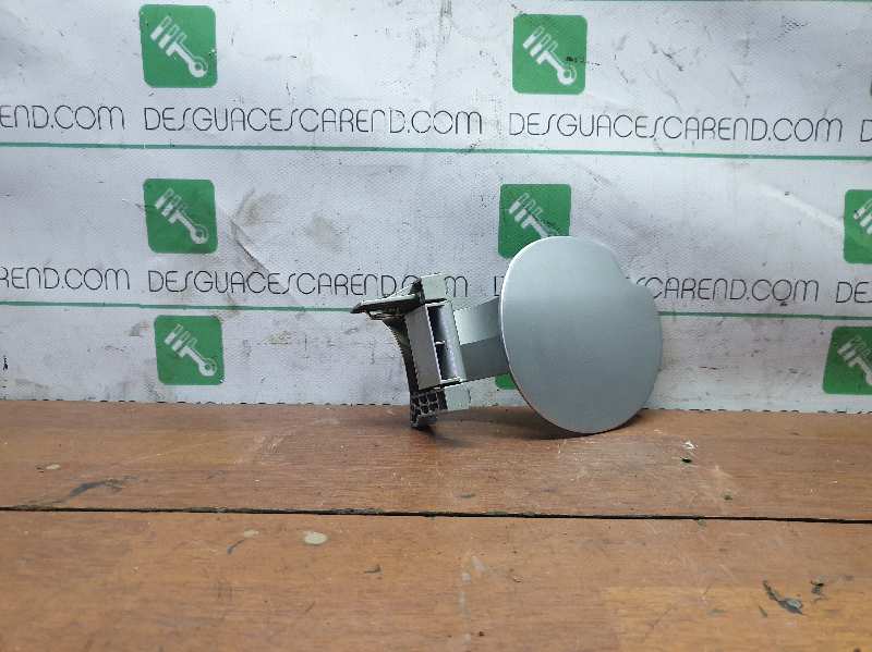 TAPA EXTERIOR COMBUSTIBLE