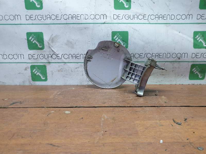 TAPA EXTERIOR COMBUSTIBLE