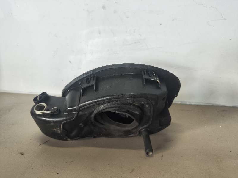 TAPA EXTERIOR COMBUSTIBLE