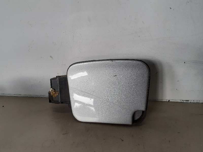 TAPA EXTERIOR COMBUSTIBLE