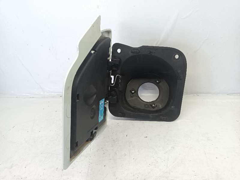 TAPA EXTERIOR COMBUSTIBLE