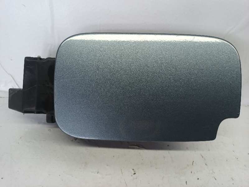 TAPA EXTERIOR COMBUSTIBLE