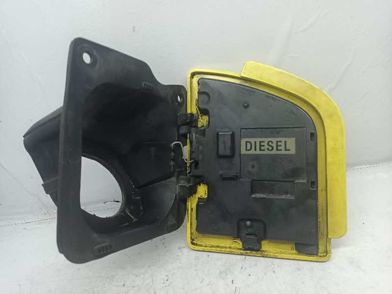 TAPA EXTERIOR COMBUSTIBLE