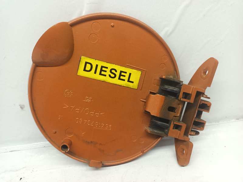 TAPA EXTERIOR COMBUSTIBLE