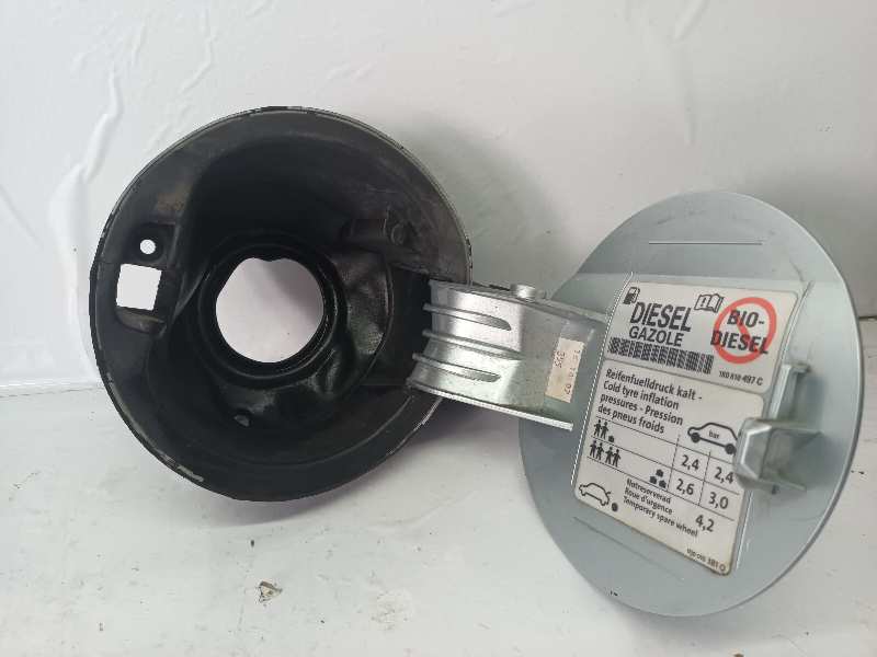 TAPA EXTERIOR COMBUSTIBLE