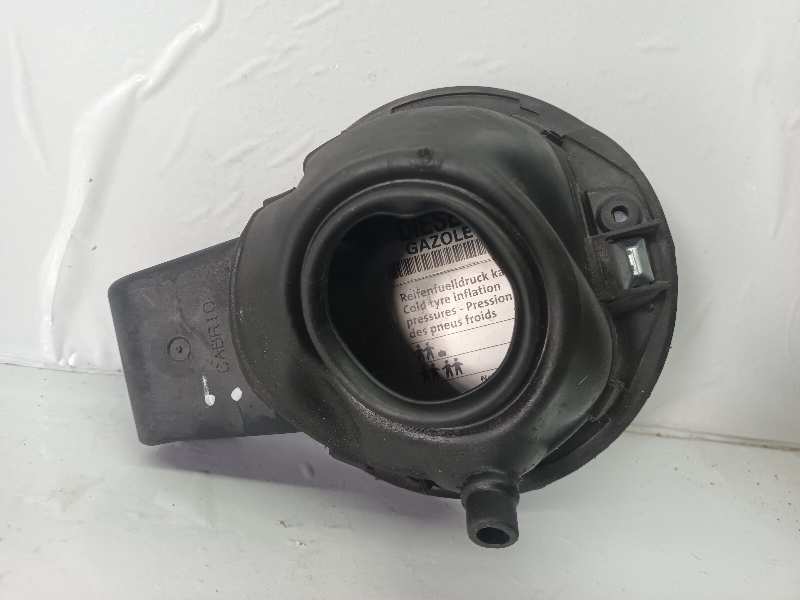 TAPA EXTERIOR COMBUSTIBLE