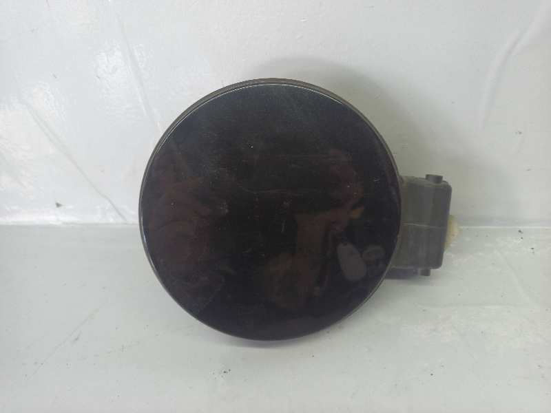 TAPA EXTERIOR COMBUSTIBLE