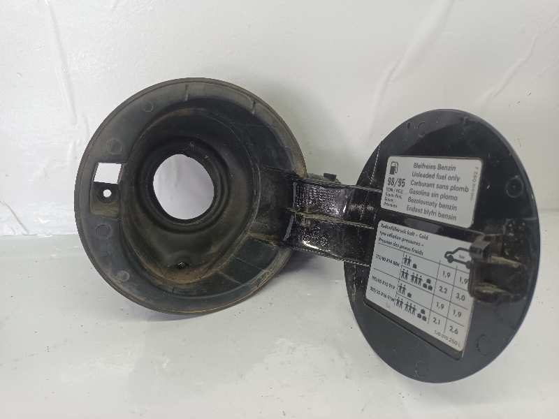 TAPA EXTERIOR COMBUSTIBLE