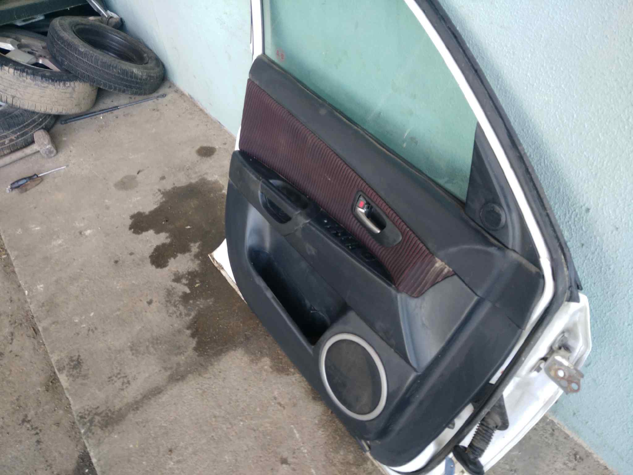 GUARNECIDO PUERTA DELANTERA IZQUIERDA